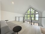 Loft has a day bed that can be used as a separate sleeping surface 