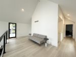 Lofted area upstairs has a day bed available for an extra sleeping surface