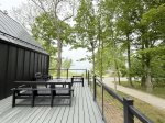 Huge upper level balcony with outdoor furniture and Lake Michigan views 