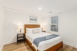 Main level queen bedroom also has an extra long twin trundle 