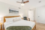 Upper level king bedroom with a leafy outlook 