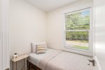 Upper level twin bedroom is perfect for one 