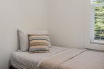 Upper level twin bedroom is perfect for one 
