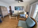Spacious living area with flat screen tv and plenty of seating