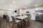 Open floor concept, looking from dining room back to living room 