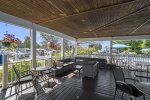 Covered patio located at outdoor pool and clubhouse 