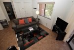 Living room with sofa sleeper and flat screen TV with Samsung Hub