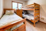 Third Bedroom with Twin Bunk Bed and Double Bed. Great for the kids. On lower level. 