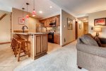 Open floorplan with breakfast bar seating for 4