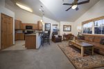 Open floor plan with living, dining, and kitchen 