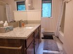 Full bath on main floor with new counters and floor