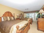 The Guest bedroom in 1839 Beachside Tennis features two queen beds