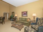 There is a Queen sleeper sofa in the living area of 1839 Beachside Tennis that allows accomodations for additional guests
