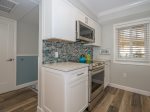 Beautiful Glass Tile Back Splash in Kitchen at 2403 Island Club