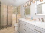Enjoy the Spa-like Master Bathroom with Quartz Marble Counter Tops at 2403 Island Club