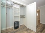 Guest Bedroom Closet with Floor Length Mirror and Plenty of Storage Space at 2403 Island Club