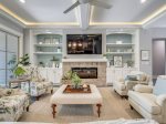 Living Room with Mounted TV and Access to Back Patio at 28 Stoney Creek
