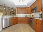 5303 Hampton Place`s kitchen includes a breakfast bar with seating for 2
