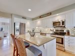 Fully Equipped Kitchen with Breakfast Bar at 1469 Sound Villa
