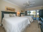 Guest Bedroom with Two Queen Beds at 1848 Beachside Tennis
