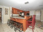 Newly Renovated Kitchen with Seating for 8 at Counter at 1848 Beachside Tennis