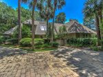 3 Marsh Island Road in Sea Pines has a large driveway and beautiful landscaping