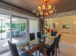 Ten people can fit around the Dining Table at 3 Marsh Island Road in Sea Pines