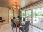 Dining Area at 3 Marsh Island Road has a sliding glass door which opens the area to the outdoors