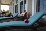 Sun loungers, sofa`s and bar table for pool side relaxation.