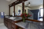 Master bathroom with double vanity and make up mirror