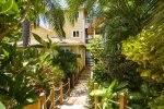 Parrots Paradise, 3 bedroom home perched on the hill overlooking West Bay Beach.