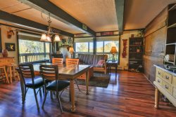 F1: This condo has fun lodge decor with a fireplace, and a view of the Roaring Fork Valley.