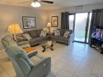 Den with Sliding Doors to Private Back Porch