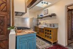 Finely appointed kitchen with farmhouse sink 