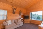 Loft Area with sofa and TV