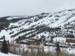 Located in the red condo buildings next to the slops