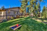 Front yard: plush lawn, landscaped, & a nice place to setup a game of corn hole