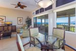 Adjacent to the living room, a dining table for four is located to offer breathtaking ocean views, making every meal a memorable experience. 