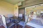 Guests will appreciate the comfort of a chaise lounge and a raised table with seating for four