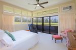 Upstairs, the master bedroom offers a serene retreat, complete with a private lanai and breathtaking views