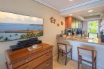 The beautifully remodeled kitchen combines elegant design with everyday convenience