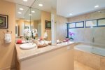 Completing the master suite, the master bathroom reflects the villas comfort and refinement
