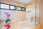 Spa-inspired in design, this space offers a tranquil retreat to unwind and rejuvenate in style