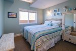 Third bedroom offers a Queen bed with coastal charm