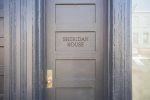 Street level door is a shared entrance, with the main door to the apartment on the second floor