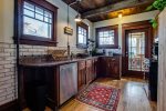 Kitchen with Door to the 3 season porch in the background