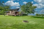 Large back yard with a firepit