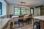 Dining nook with built in benches and handcrafted table