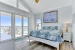 King master bedroom with a beautiful gulf view and balcony access.