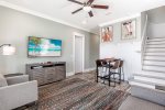 Entryway & common area on the 1st floor of the home with a side door to outside.